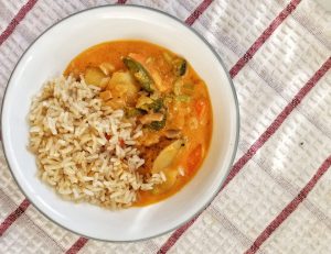 Vegetable Thai-style curry with a side of brown rice