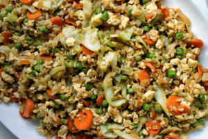 Oil-free "fried" rice with veggies served on a platter