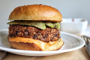 Oil-free, baked black bean rice veggie burger with avocado