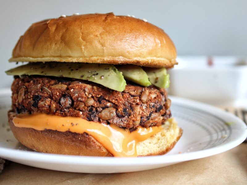 Oil-free, baked black bean rice veggie burger with avocado