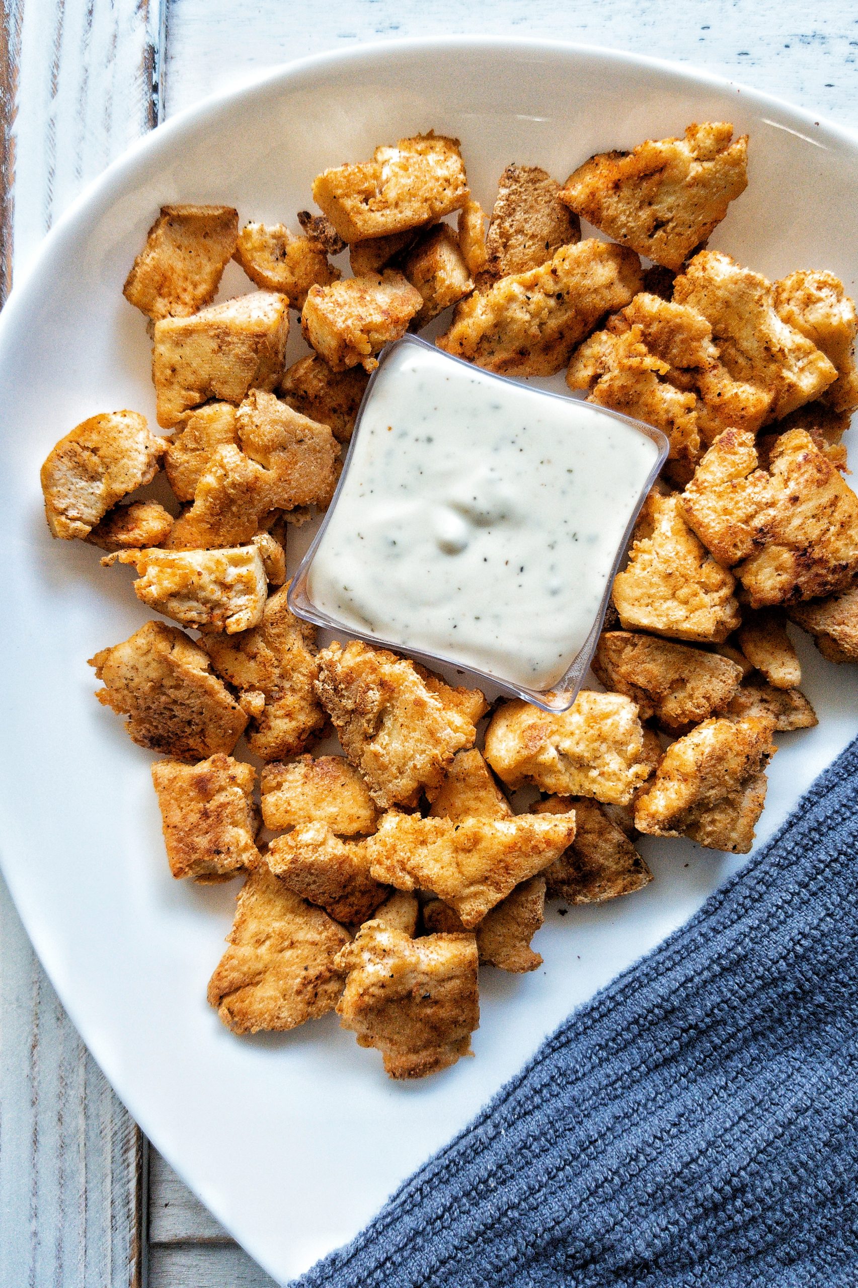 Tofu Chicken chunks on a white platter