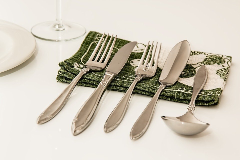 Silverware on kitchen linen