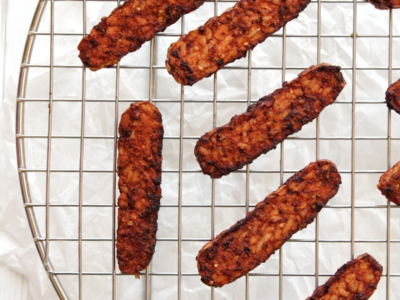 Air fryer tempeh bacon on a cooling rack
