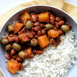 Puerto Rican habichuelas guisadas with a side of rice