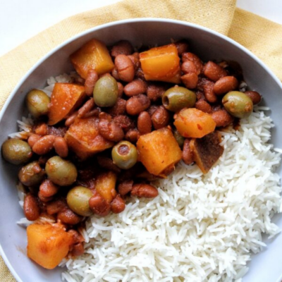 Puerto Rican habichuelas guisadas with a side of rice