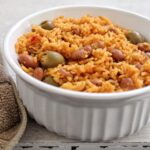 Puerto Rican arroz con habichuelas in a small bowl