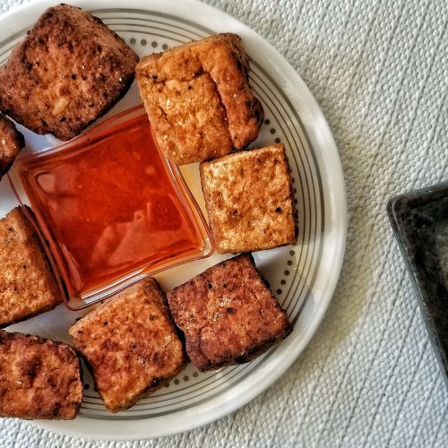Large chunks of pan-fried firm tofu