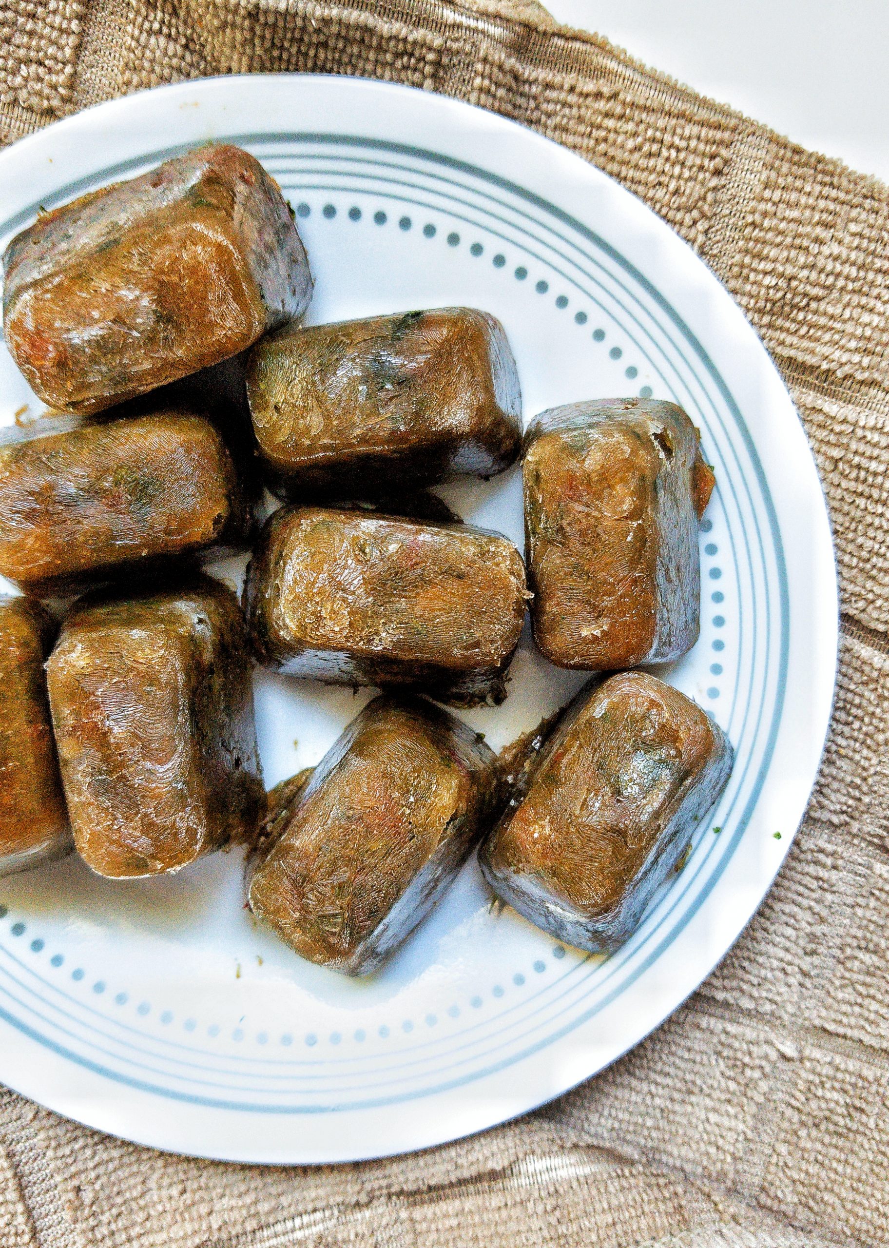 Image with sofrito frozen into ice cubes from an ice cube tray 