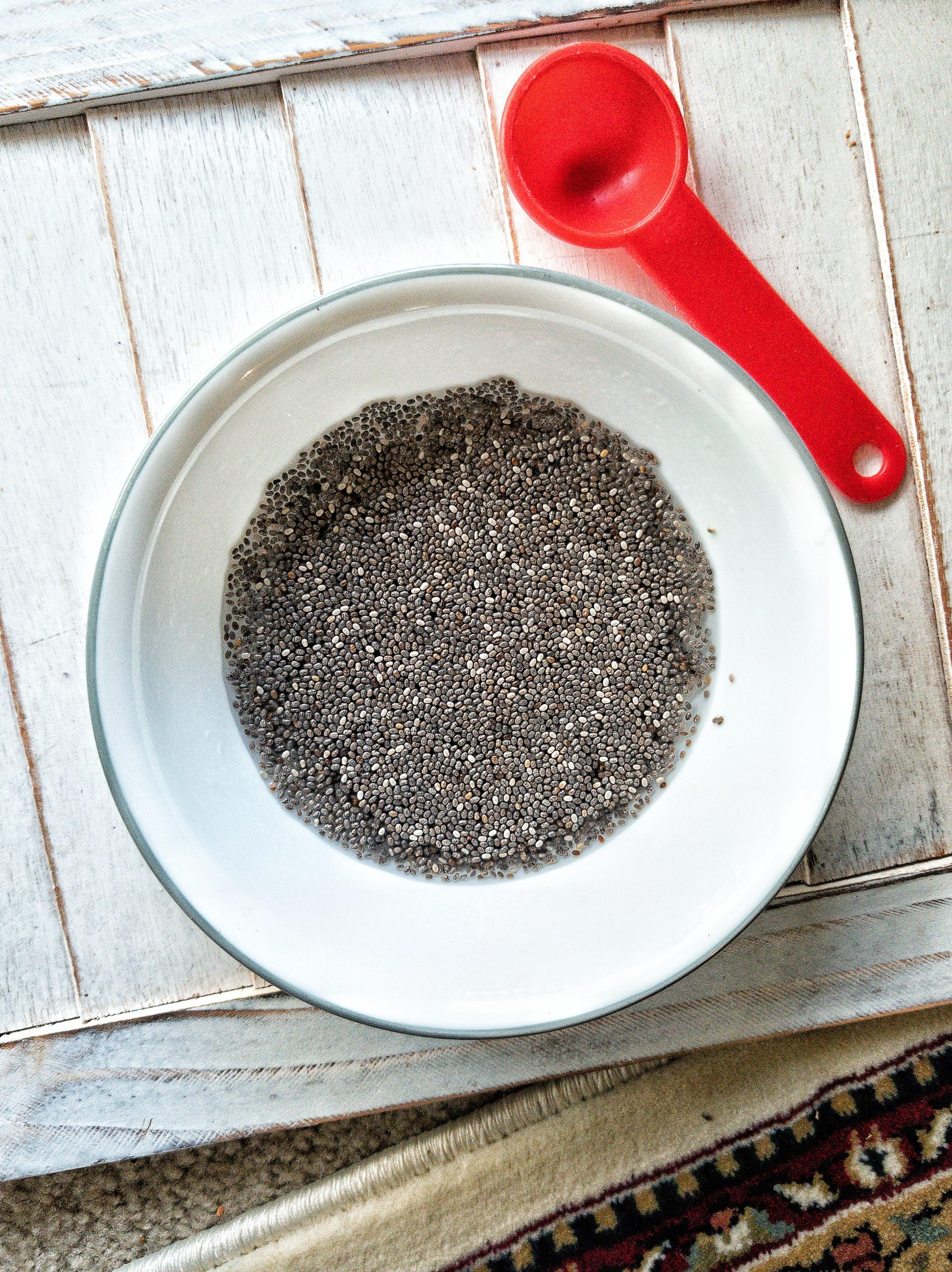 Chia seeds soaking in a bowl of water 