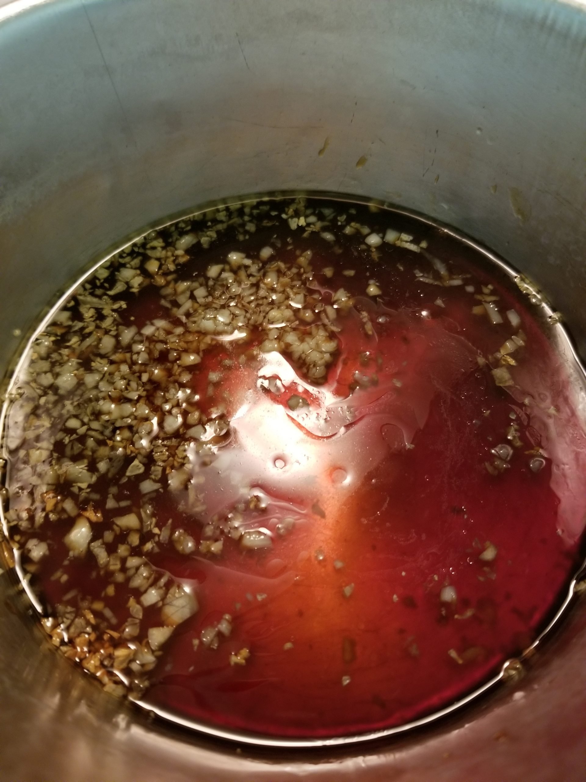 Minced garlic mixed with soy sauce, teriyaki sauce, honey, and water