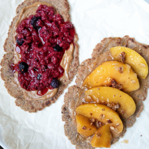 Cinnamon brown sugar flatbread. One flatbread topped with mixed berries and the other with ripe peaches, granola, and honey.