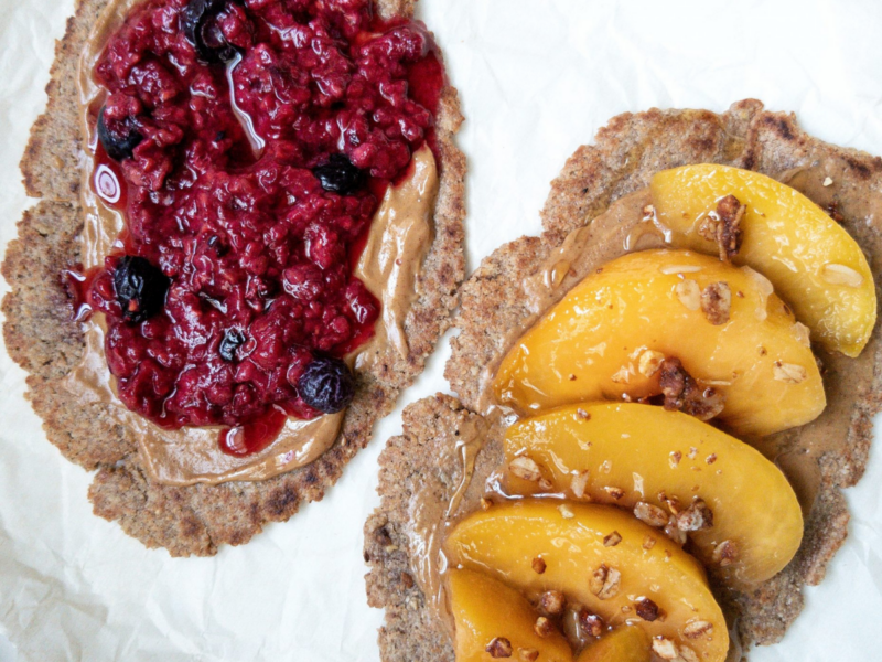Cinnamon brown sugar flatbread. One flatbread topped with mixed berries and the other with ripe peaches, granola, and honey.