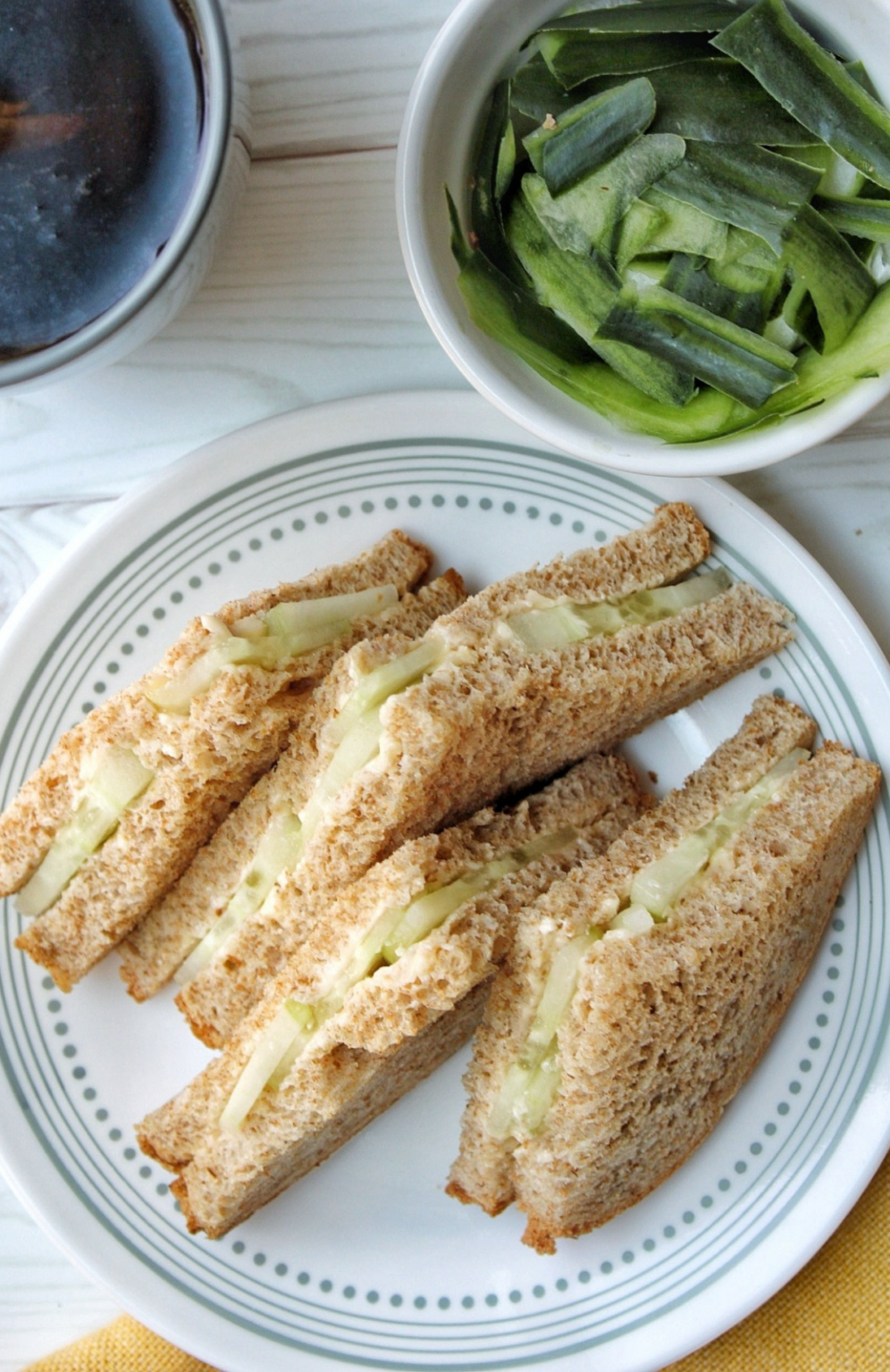 Cucumber tea sandwich with whole wheat bread a side of tea