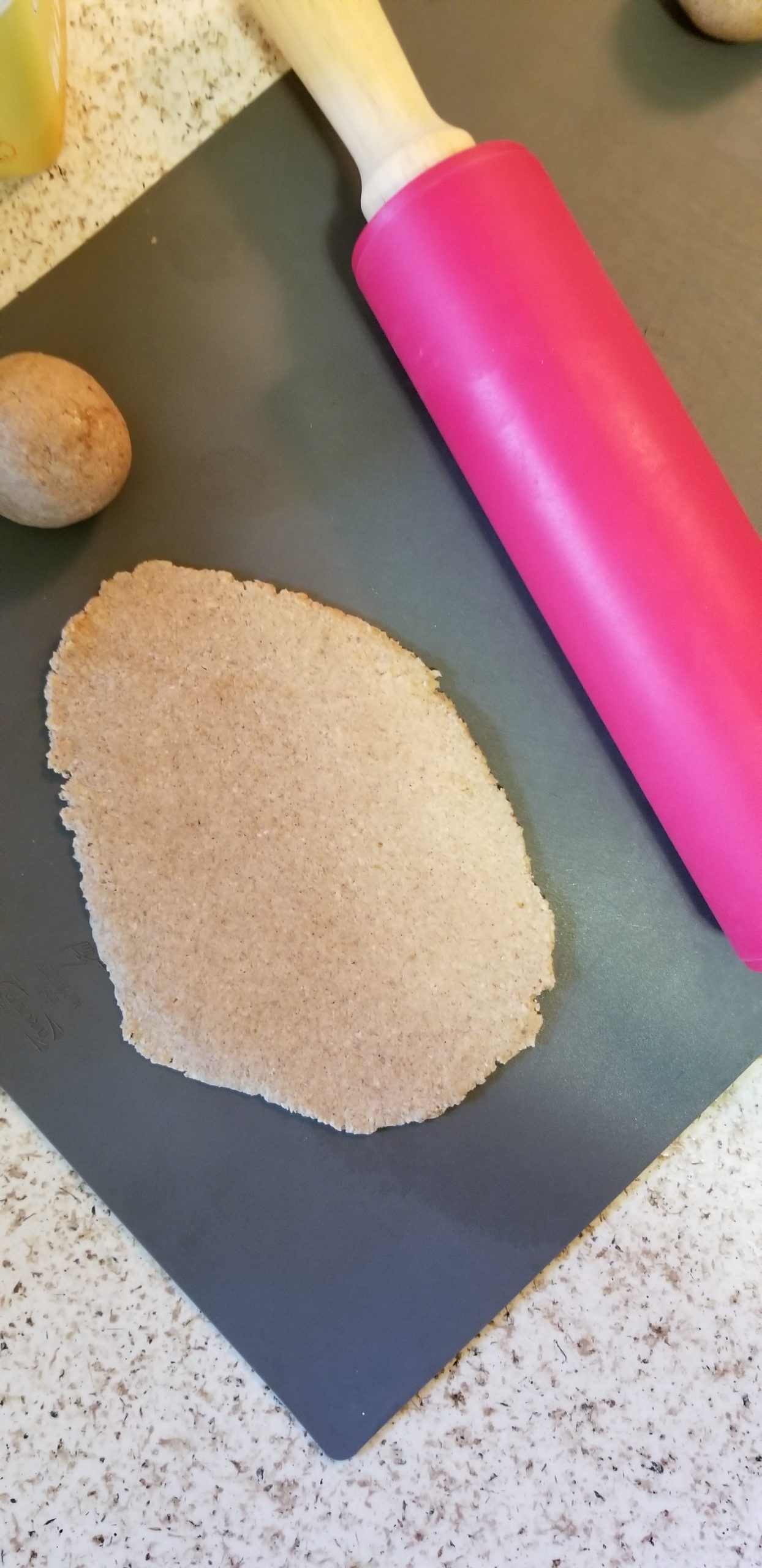 oat flour dough flatten with roller