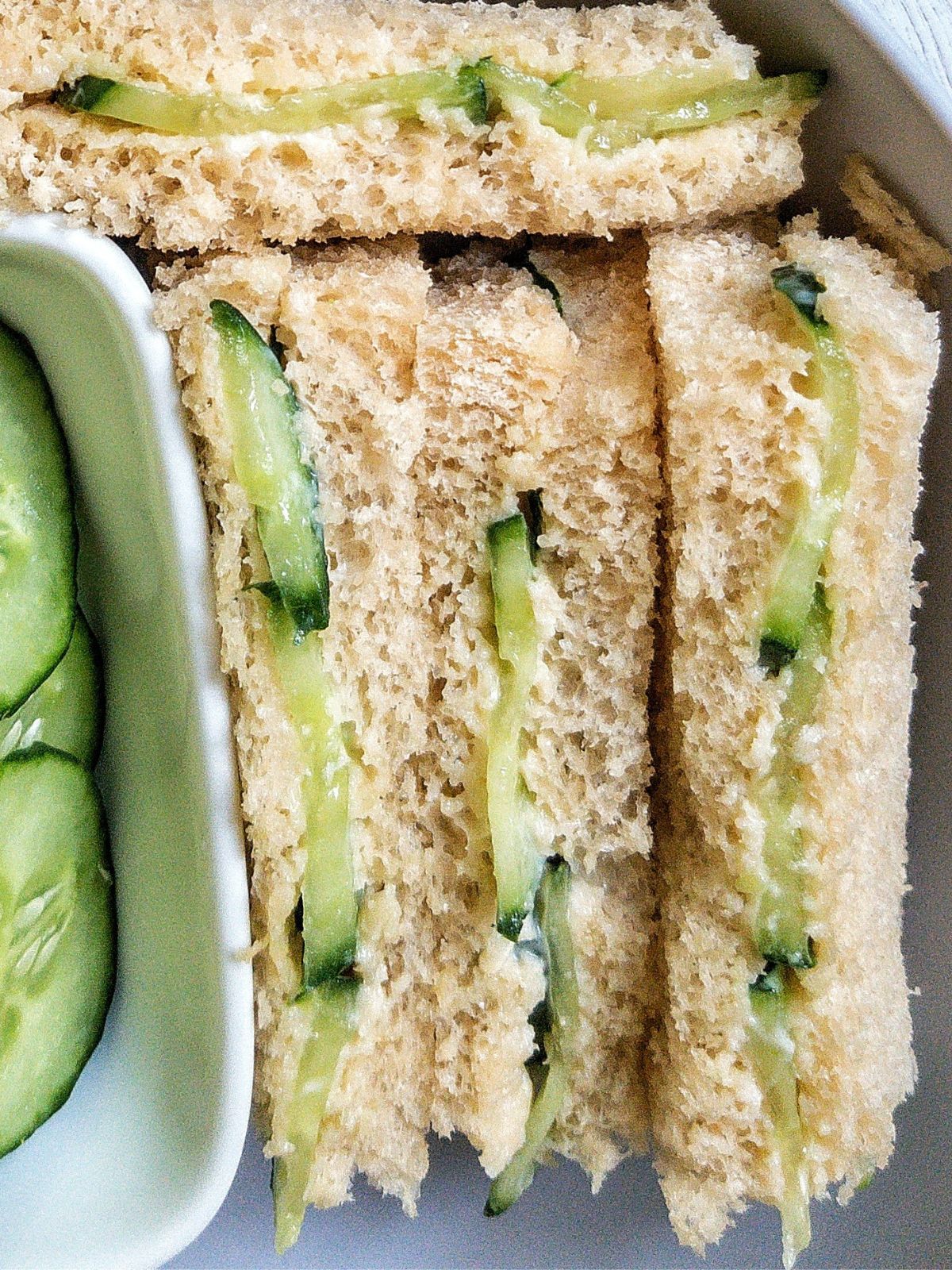 Closeup of cucumber tea sandwiches.