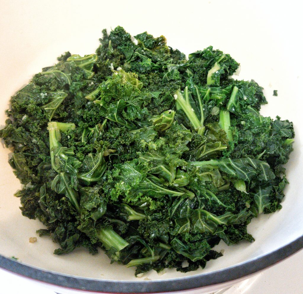 Garlic butter braised kale in a dutch oven