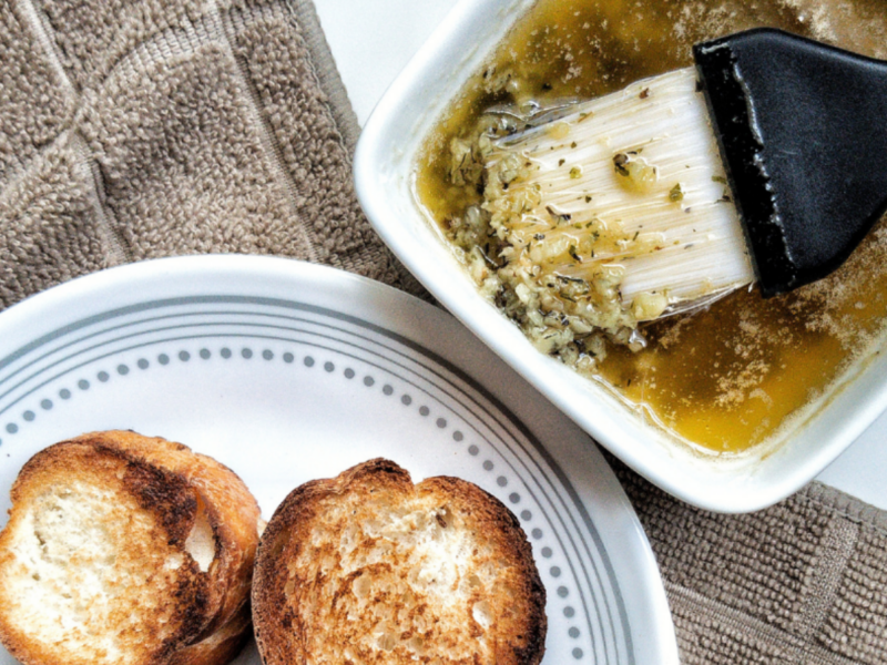 Bread with a side of melted garlic butter dipping sauce
