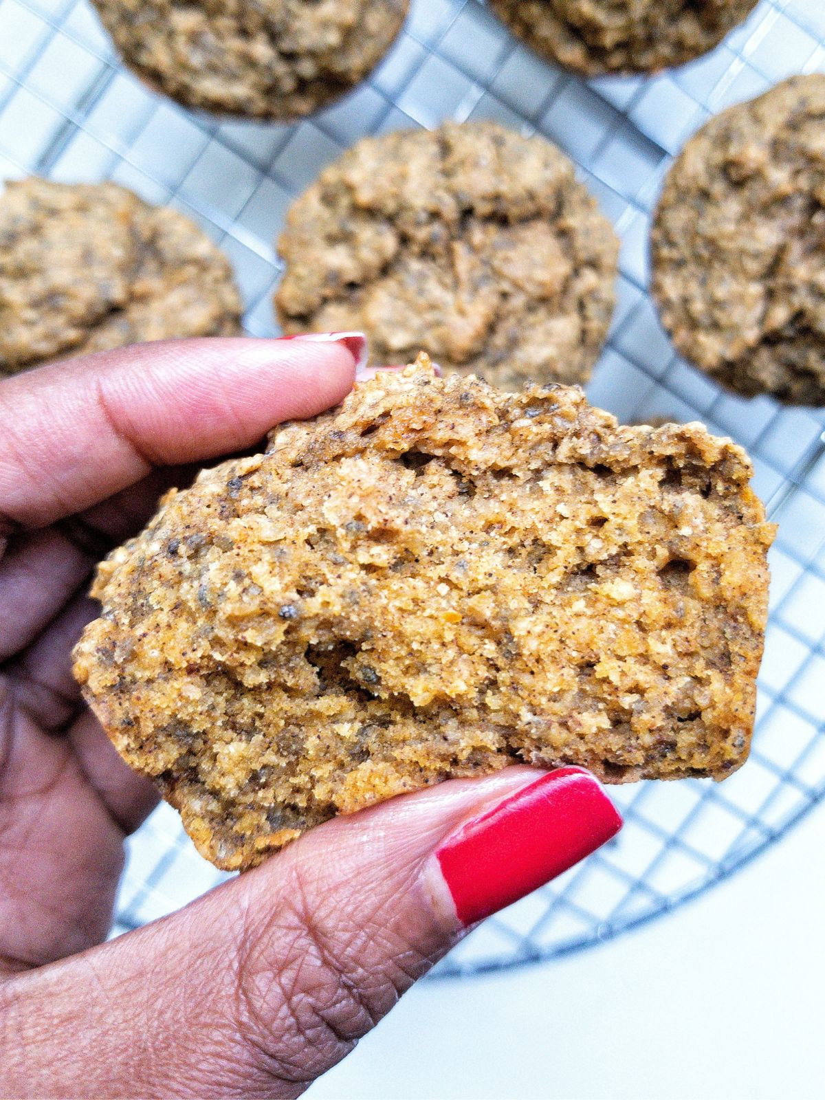 Inside of a vegan pumpkin muffin with chia seeds. 
