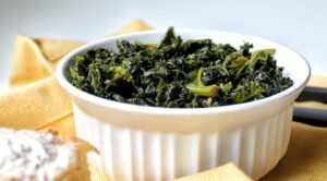 Braised kale in a white bowl