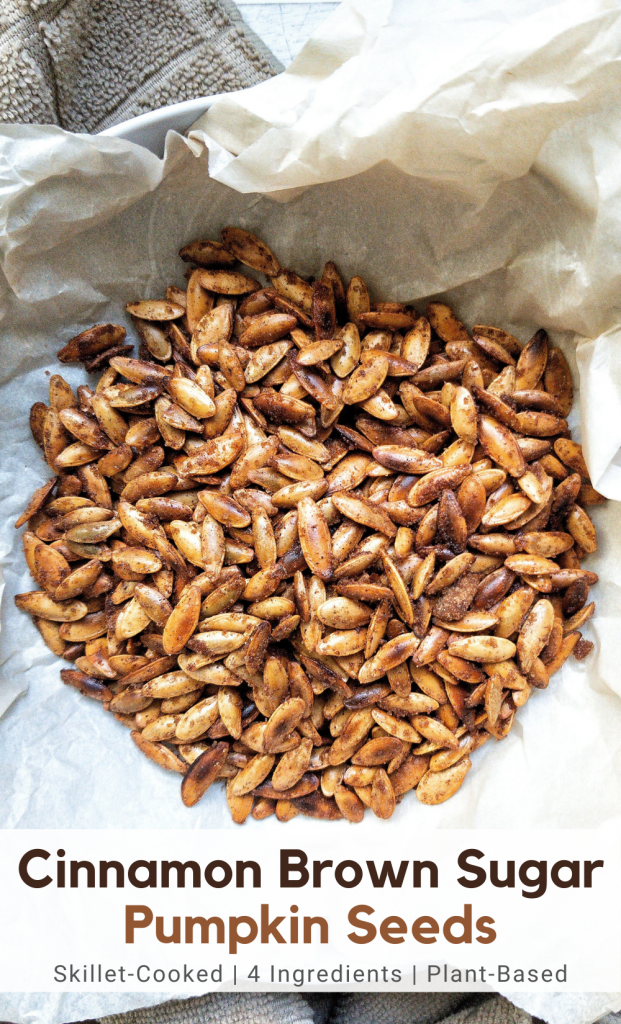 Pinnable for Pinterest. Close-up toasted skillet cinnamon brown sugar pumpkin seeds in a bowl lined with parchment paper