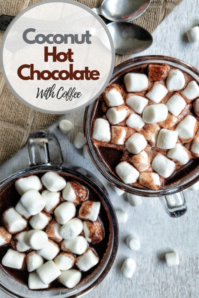 Pinnable for Pinterest. Two mugs of creamy coconut hot chocolae topped with marshmallows.