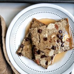 Pancake squares from gluten-free oven sheet pancakes topped with sliced almonds and vegan chocolate chips