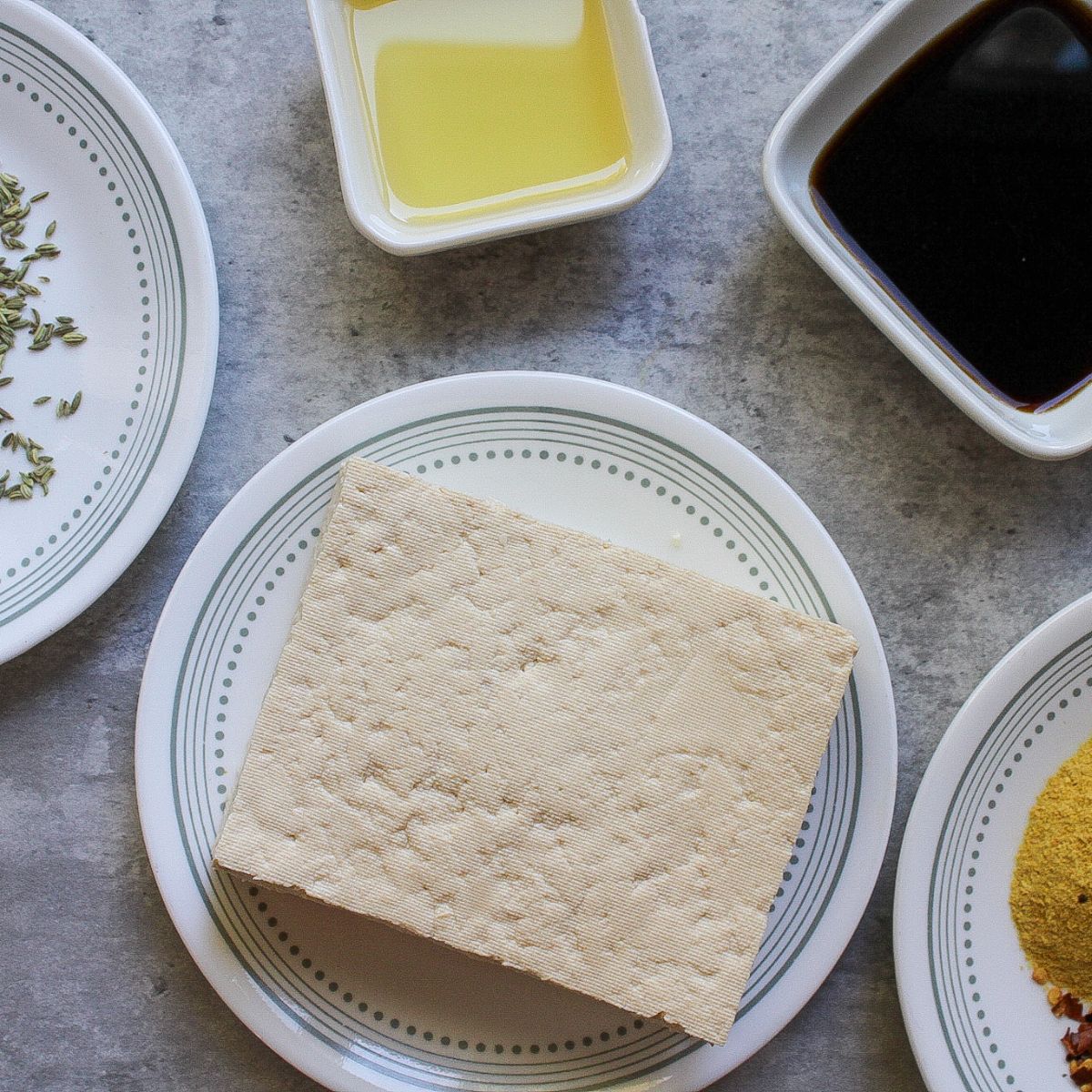 Block of tofu, spices, liquid aminos, avocado oil, and crushed fennel seeds.