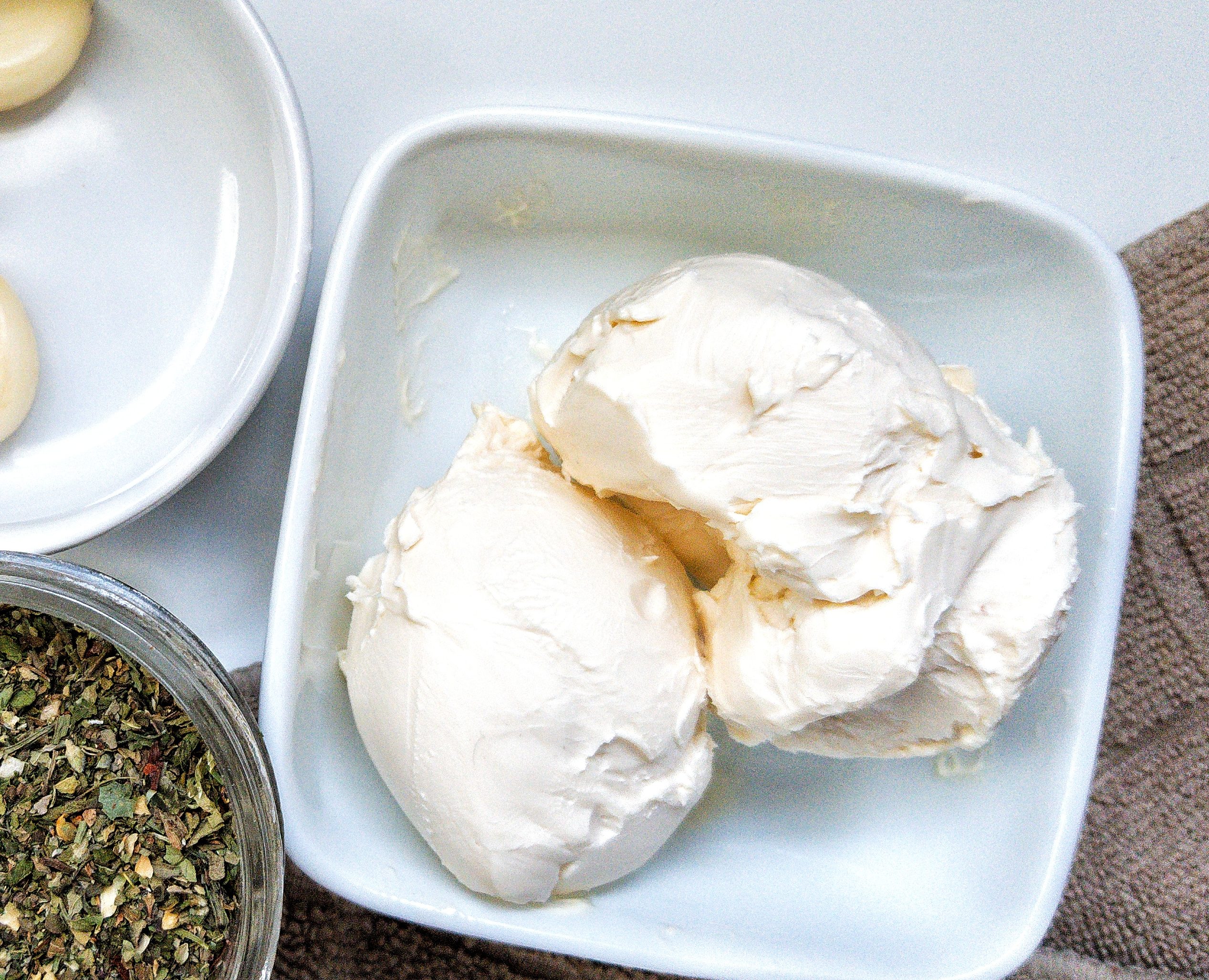 Vegan butter in a small white glass dish