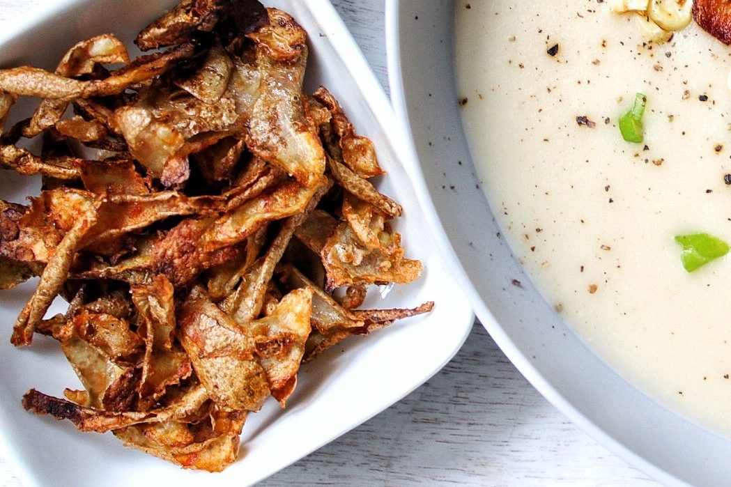 Roasted potato peels in a small bowl 