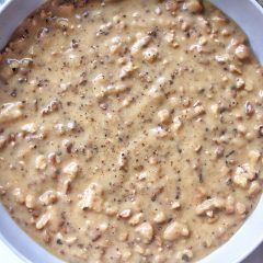 Vegan tofu sauasge gravy in a gray bowl