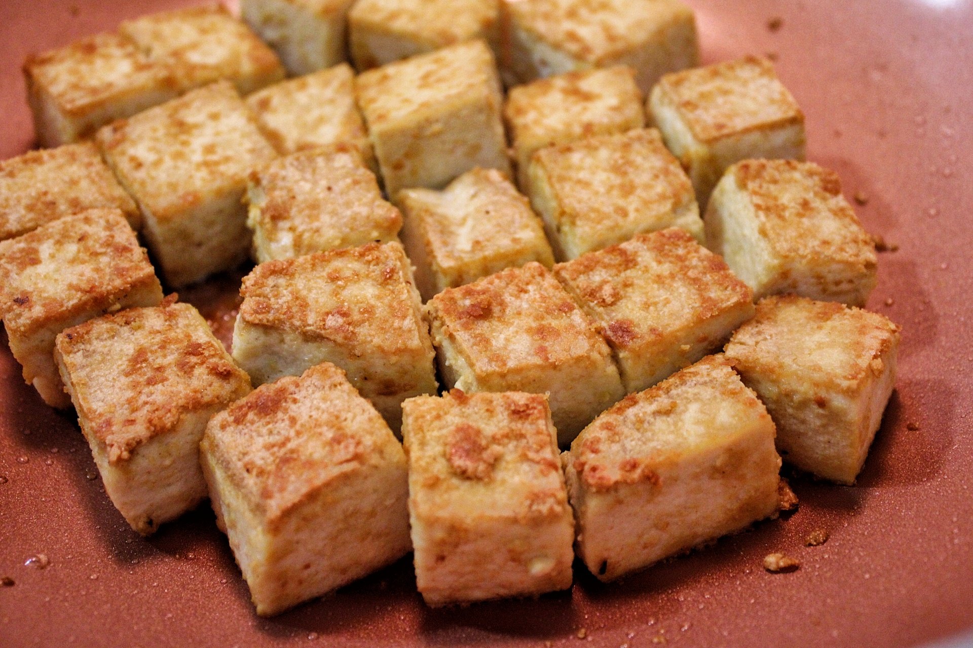 Pan-fried tofu seasoned with salt and nutritional yeast 