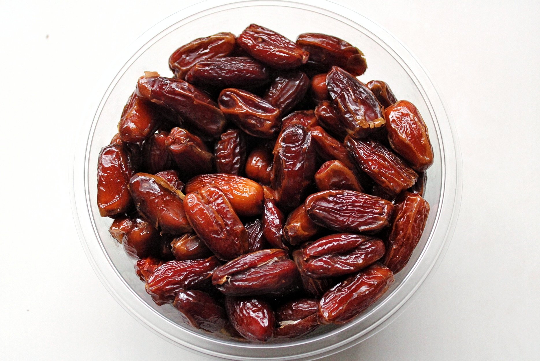 Bowl of dates in a glass bowl