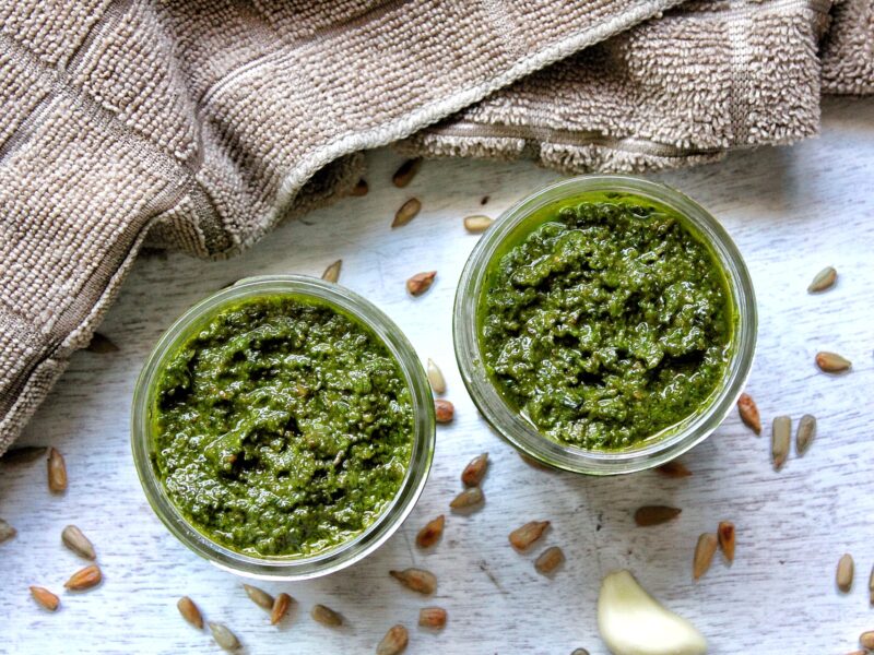 Two 4-ounce canning jars with vegan pesto