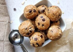 Small bowl of edible cookie dough balls with chocolate chips