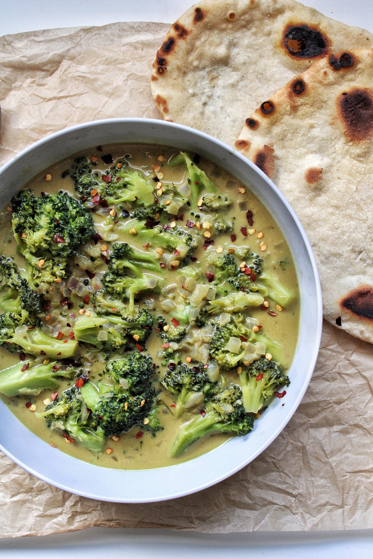 Vegetarian broccoli curry with a side of homemade naan 
