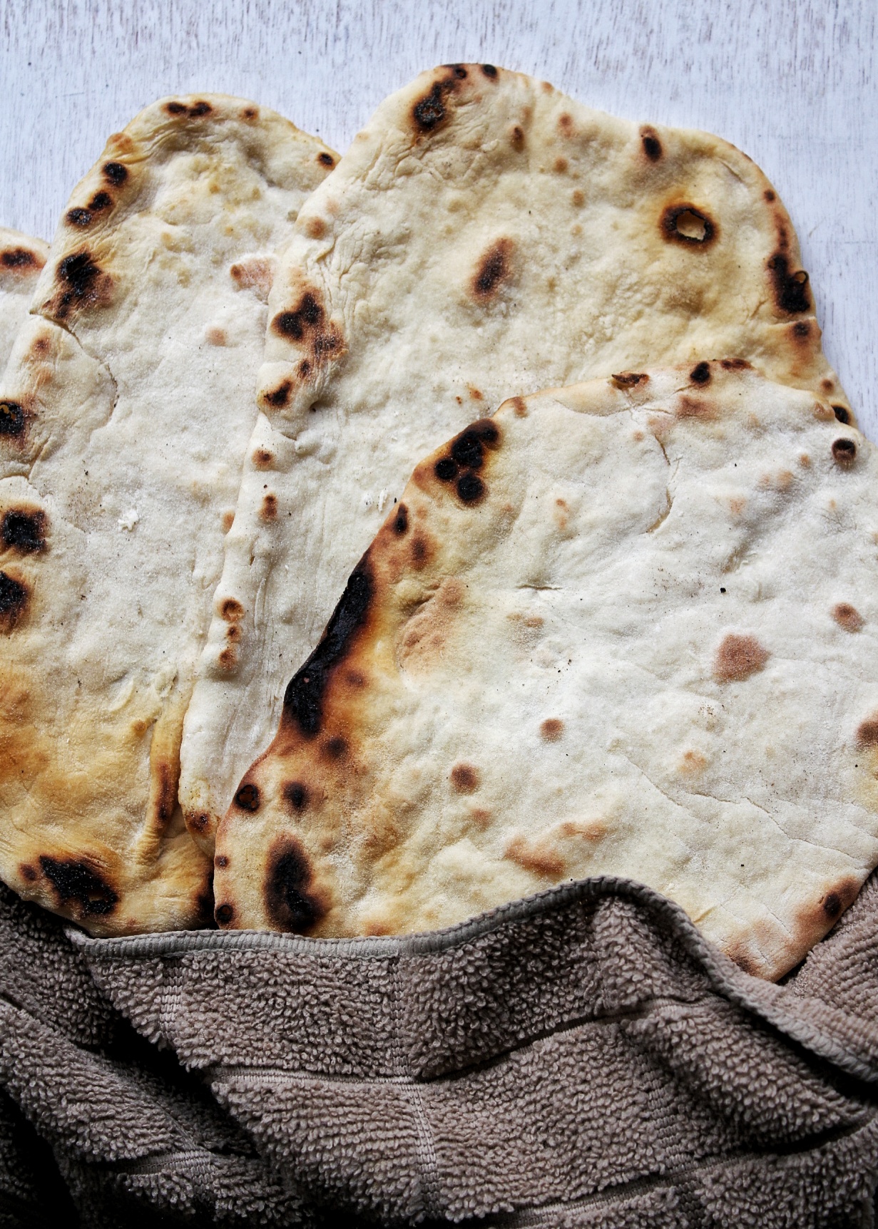 Flatbread wrapped in a tea towel