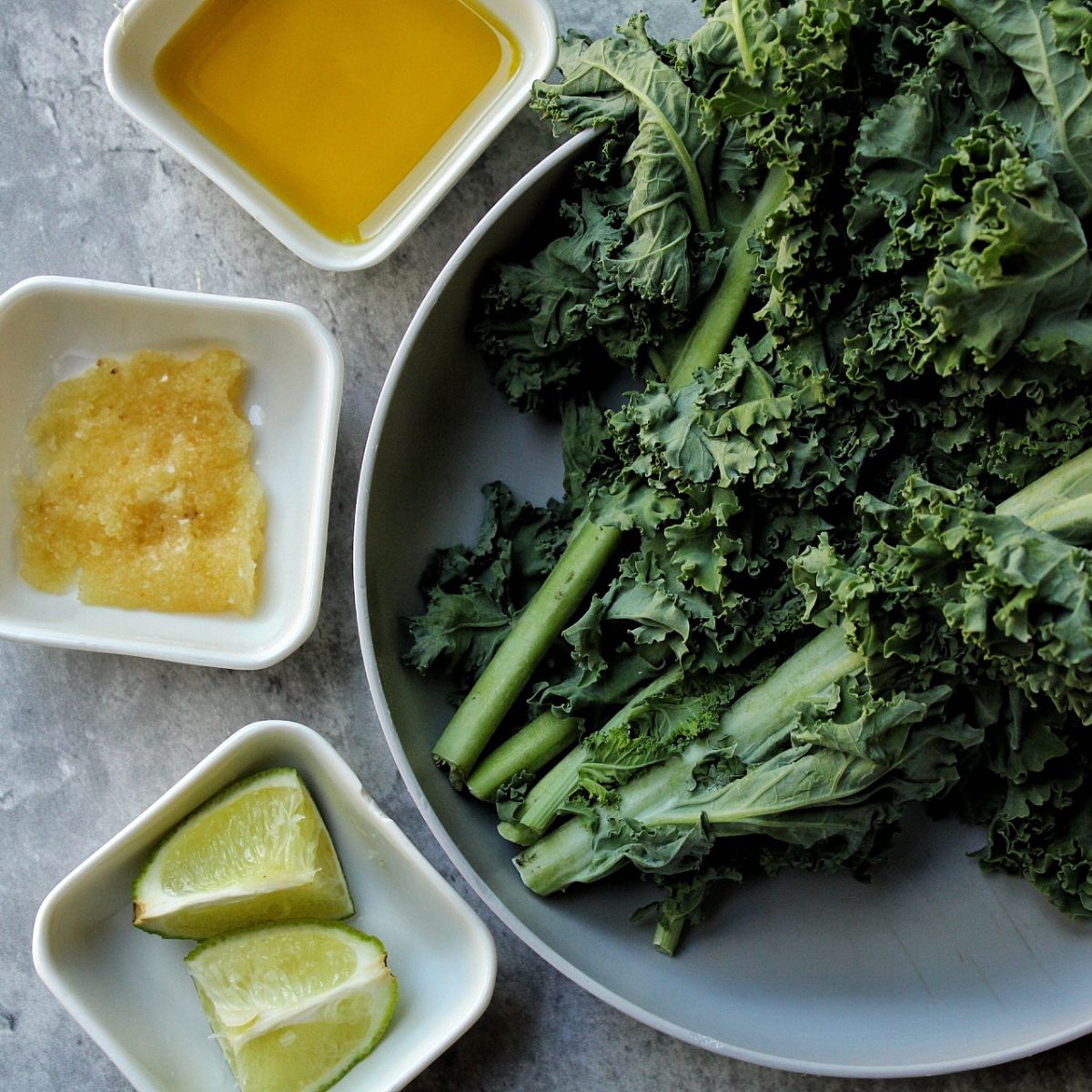 Kale, sliced lime, minced garlic, and oil.  