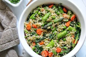 Spring fried rice with vegetables in a bowl.