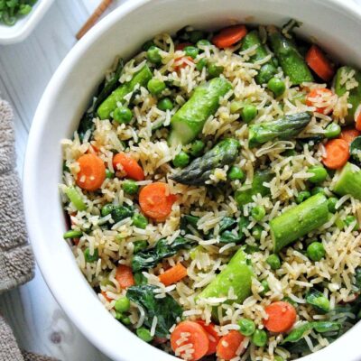 Spring fried rice with vegetables in a bowl.