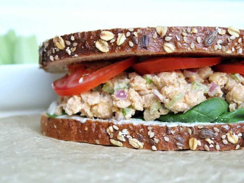 Vegan chickpea salad with tomatoes and spinach