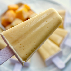 Mango coconut popsicle with frozen mangoes.