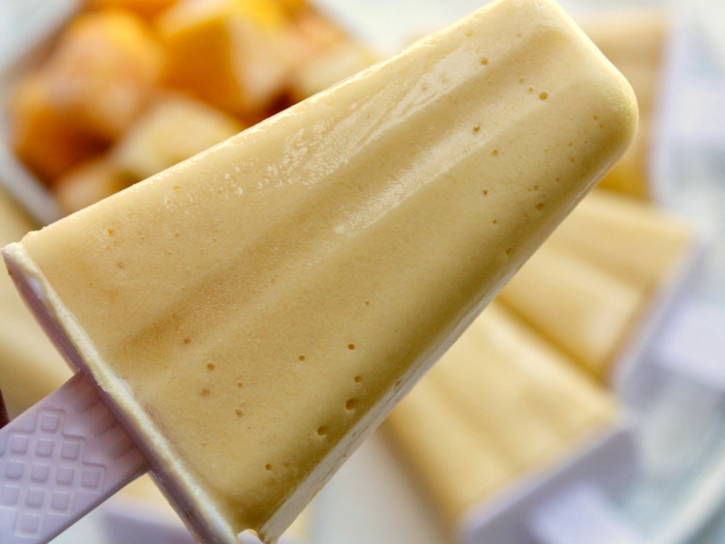 Mango coconut popsicle with frozen mangoes.