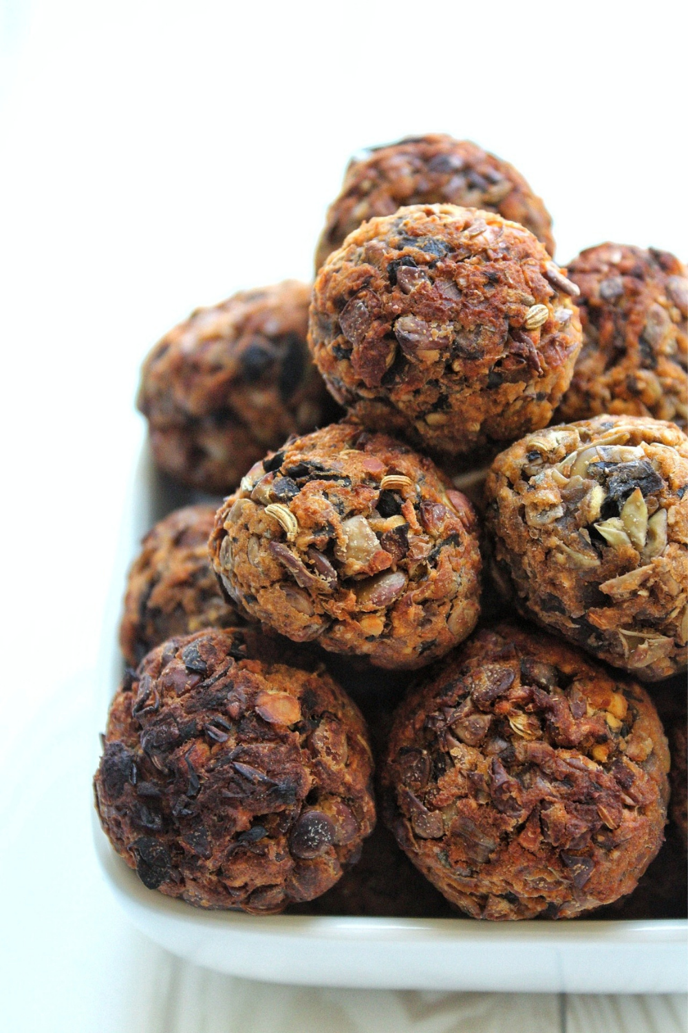 Cooked lentil meatballs in a bowl