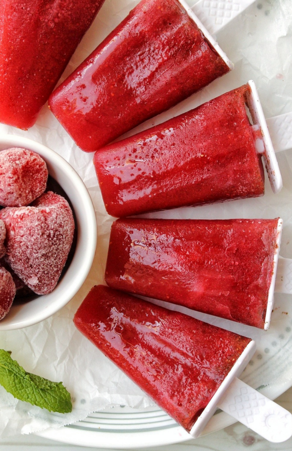 Close up of strawberry popsicles. 