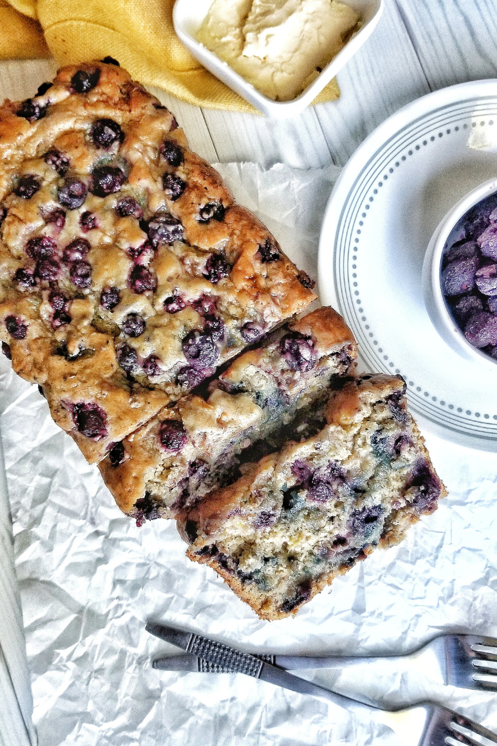 Sliced loaf of blueberry banana bread 