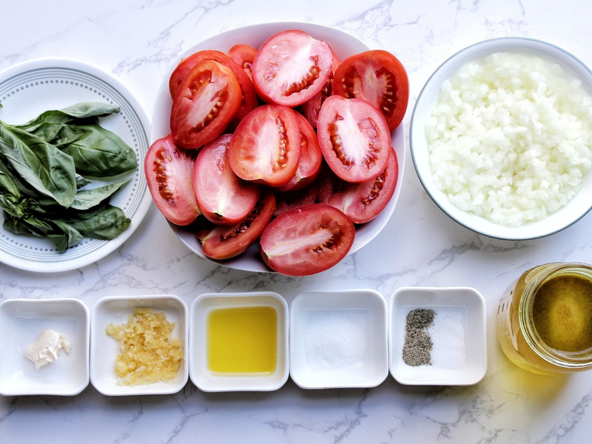 Basil leaves, Roma tomato halves, chopped onion, vegan butter, crushed garlic, olive oil, sugar, black pepper, salt, vegetable broth. 