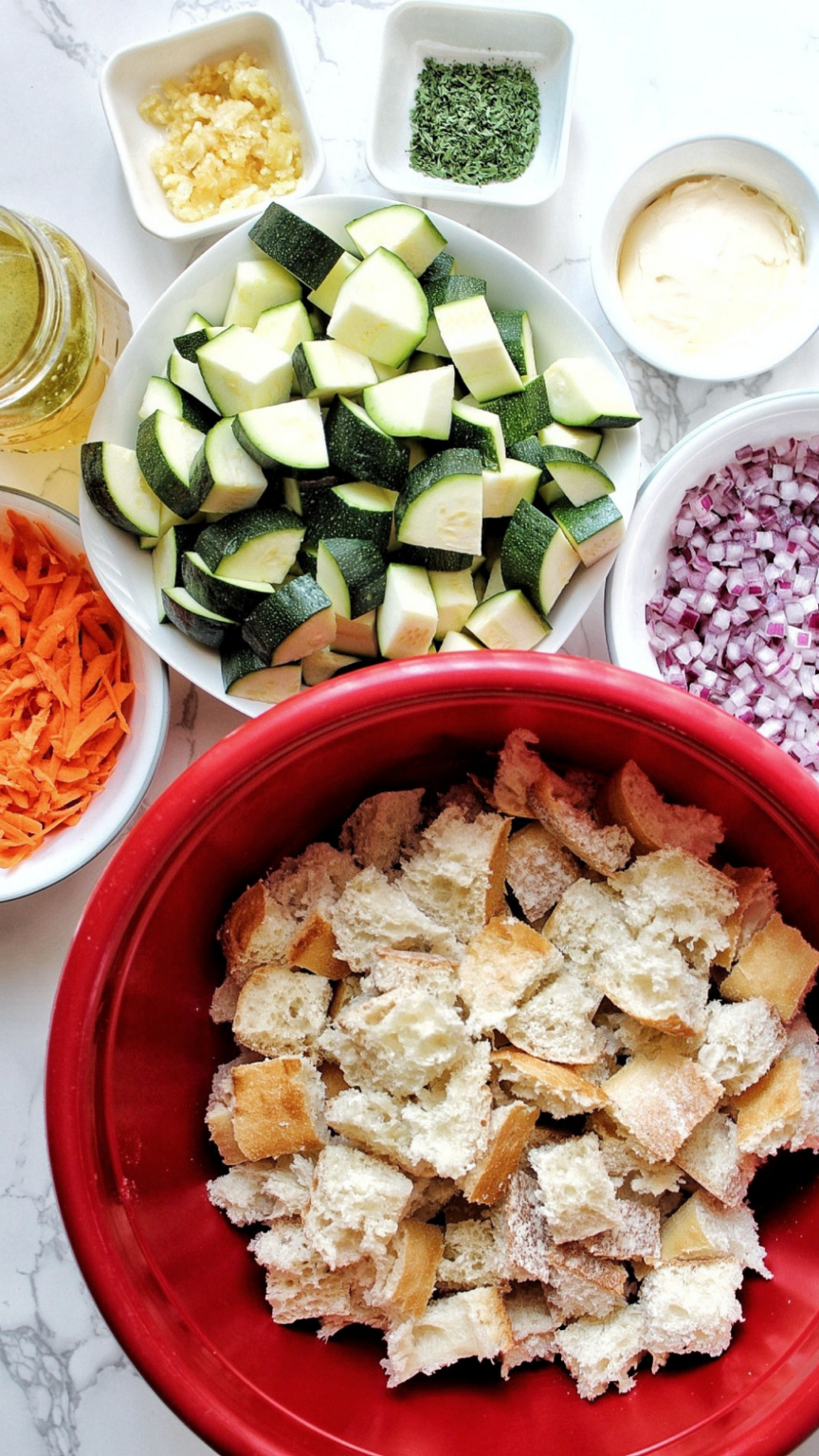 Chopped zucchini, vegan butter, parsley, crushed garlic, vegetable stock, chopped onion, cubed bread, shredded carrots. 