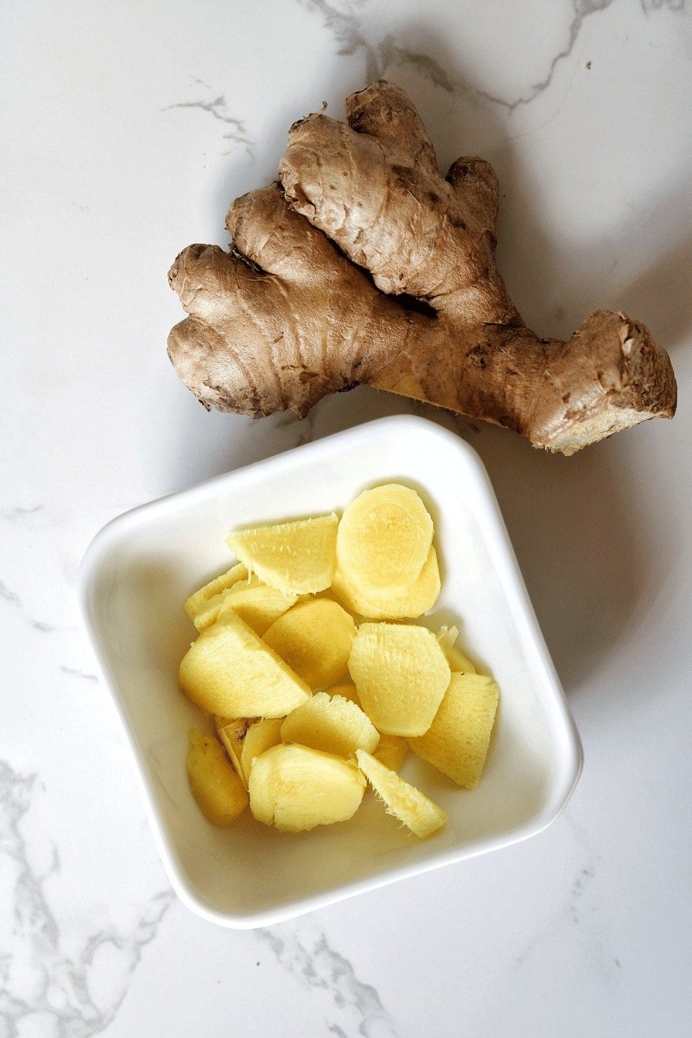 Ginger root with sliced ginger.