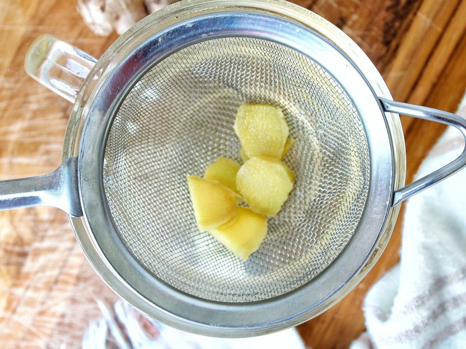 Ginger tea with a strainer. 