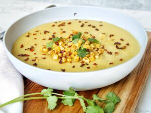 Creamy corn soup with cilantro and roasted corn.